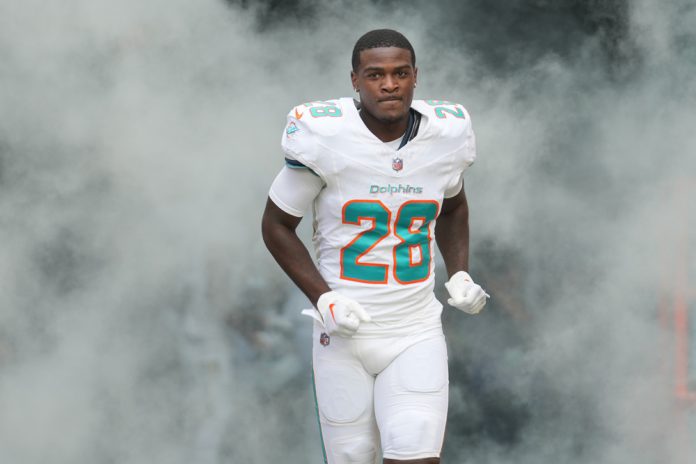 Miami Dolphins running back De'Von Achane (28) enters the field during pregame introductions during the game between the Las Vegas Raiders and the Miami Dolphins on Sunday, November 19, 2023 at Hard Rock Stadium, Miami, Fla.