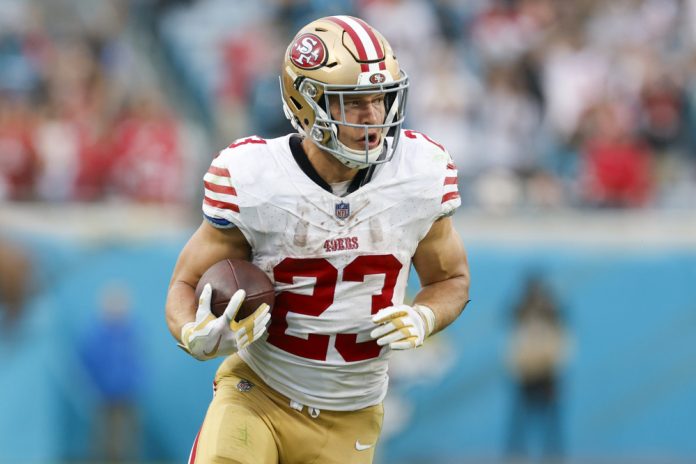 San Francisco 49ers running back Christian McCaffrey (23) runs with the ball during the game between the San Francisco 49ers and theJacksonville Jaguars on November 12, 2023 at EverBank Stadium in Jacksonville, Florida.