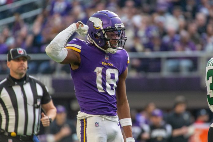 Minnesota Vikings wide receiver Justin Jefferson (18) celebrates catching a pass during the NFL game between the New York Jets and the Minnesota Vikings on December 4th, 2022, at U.S. Bank Stadium, in Minneapolis, MN.