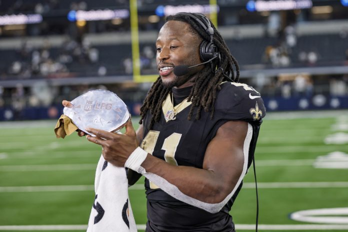 New Orleans Saints running back Alvin Kamara (41) gets the Tom Brady LFG Player of the game award after the game between the Dallas Cowboys and the New Orleans Saints on September 15, 2024 at AT&T Stadium in Arlington, Texas.