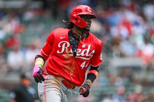 Cincinnati shortstop Elly De La Cruz (44) reacts after hitting a home run during the first game of a MLB doubleheader between the Cincinnati Reds and the Atlanta Braves on July 24th, 2024 at Truist Park in Atlanta, GA.