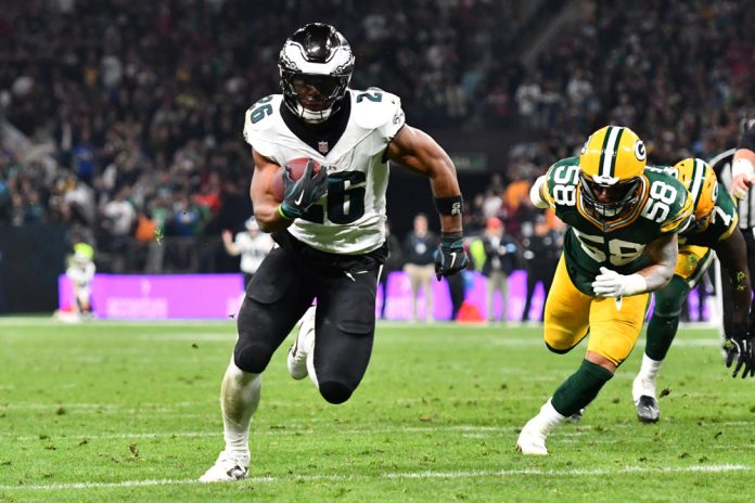 Philadelphia Eagles running back Saquon Barkley (26) carries the ball during an NFL game between the Green Bay Packers and the Philadelphia Eagles on September 6, 2024, at Arena Corinthians in Sao Paulo, Brazil.