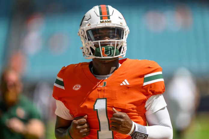 Miami quarterback Cam Ward (1) warms up before the college football game between the Ball State Cardinals and the University of Miami Hurricanes on September 14, 2024 at the Hard Rock Stadium in Miami Gardens, FL.