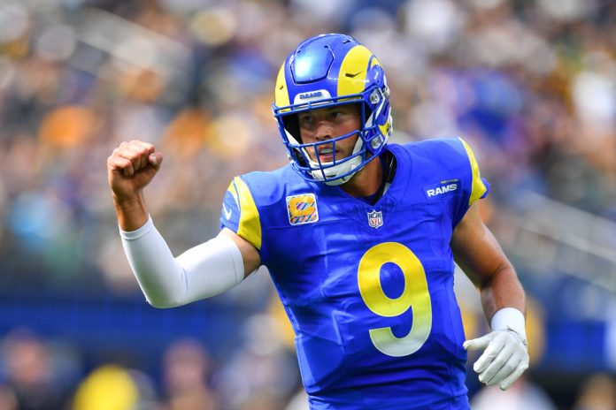 Los Angeles Rams quarterback Matthew Stafford (9) celebrates a touchdown during the NFL game between the Green Bay Packers and the Los Angeles Rams on October 6, 2024, at SoFi Stadium in Inglewood, CA.