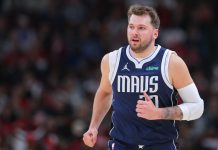 Luka Doncic #77 of the Dallas Mavericks looks on during the first half against the Chicago Bulls at United Center on March 11, 2024 in Chicago, Illinois.