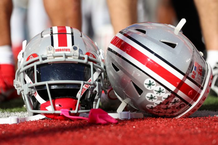 Ohio State Buckeyes helmets sit on the field after the game against the Nebraska Cornhuskers and the Ohio State Buckeyes on October 26, 2024, at Ohio Stadium in Columbus, OH.